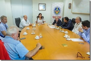 Foto reunión Colegio Médico y comercio