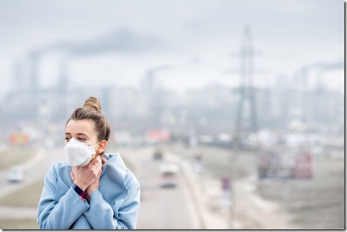 Woman with mask in the city