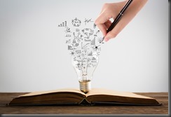 Book and light bulb with hand drawing graph