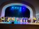 Agrupaciones de danza folclórica presentándose en el escenario del Teatro Jaime Guerre en María Elena