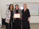 Mujeres emprendedoras recibiendo sus certificados de capacitación de SernamEG en Antofagasta.